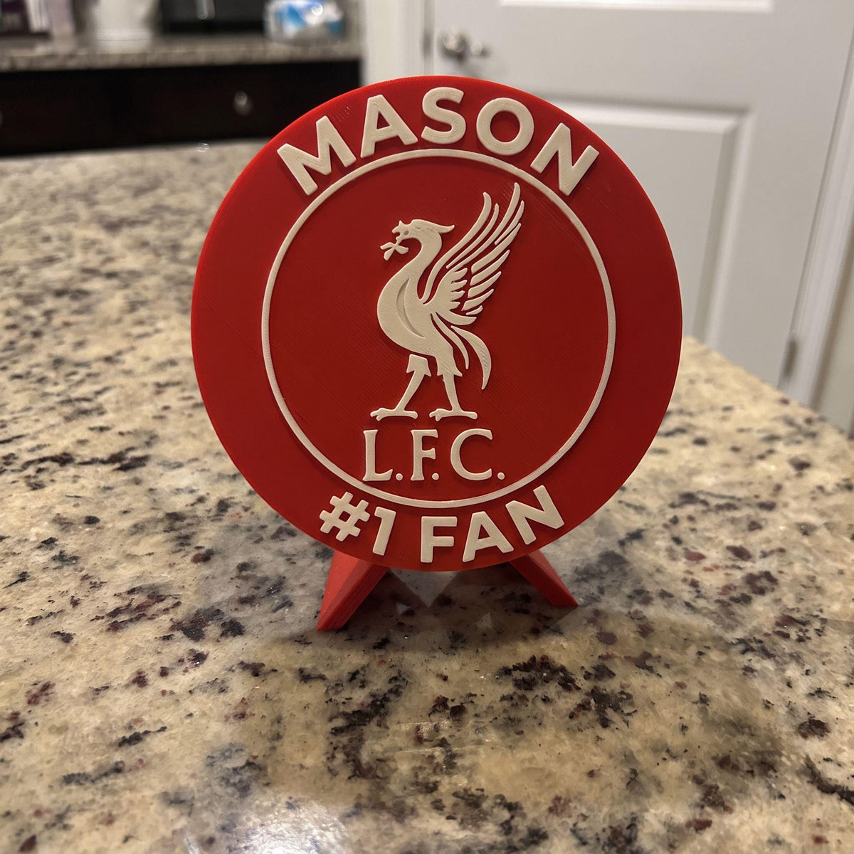Liverpool FC personalized roundel — custom name and #1 Fan arc text example, 3D printed fan display with stand, made in USA
