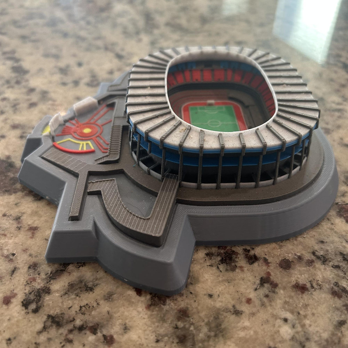 Multicolor 3D printed Estadio Azteca model showing seating tiers, blue concourse rings and green pitch, Mexican soccer fan collector gift, no paint, made in USA