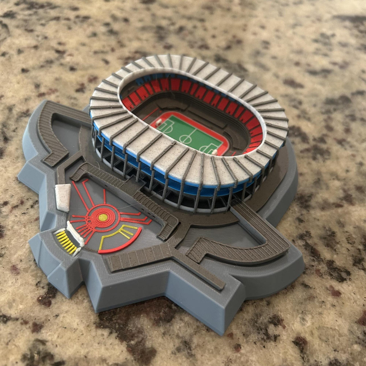Multicolor 3D printed Estadio Azteca model showing seating tiers, blue concourse rings and green pitch, Mexican soccer fan collector gift, no paint, made in USA