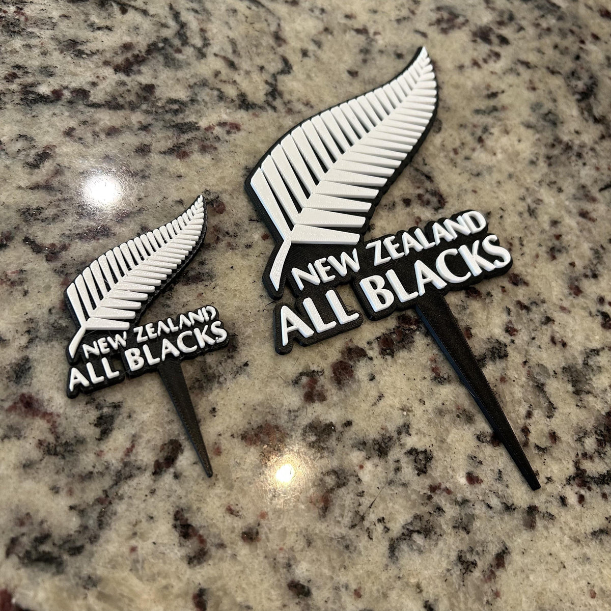 New Zealand All Blacks 3D printed cake topper and cupcake toppers, food-grade PETG silver fern emblem, rugby birthday party decoration, made in USA