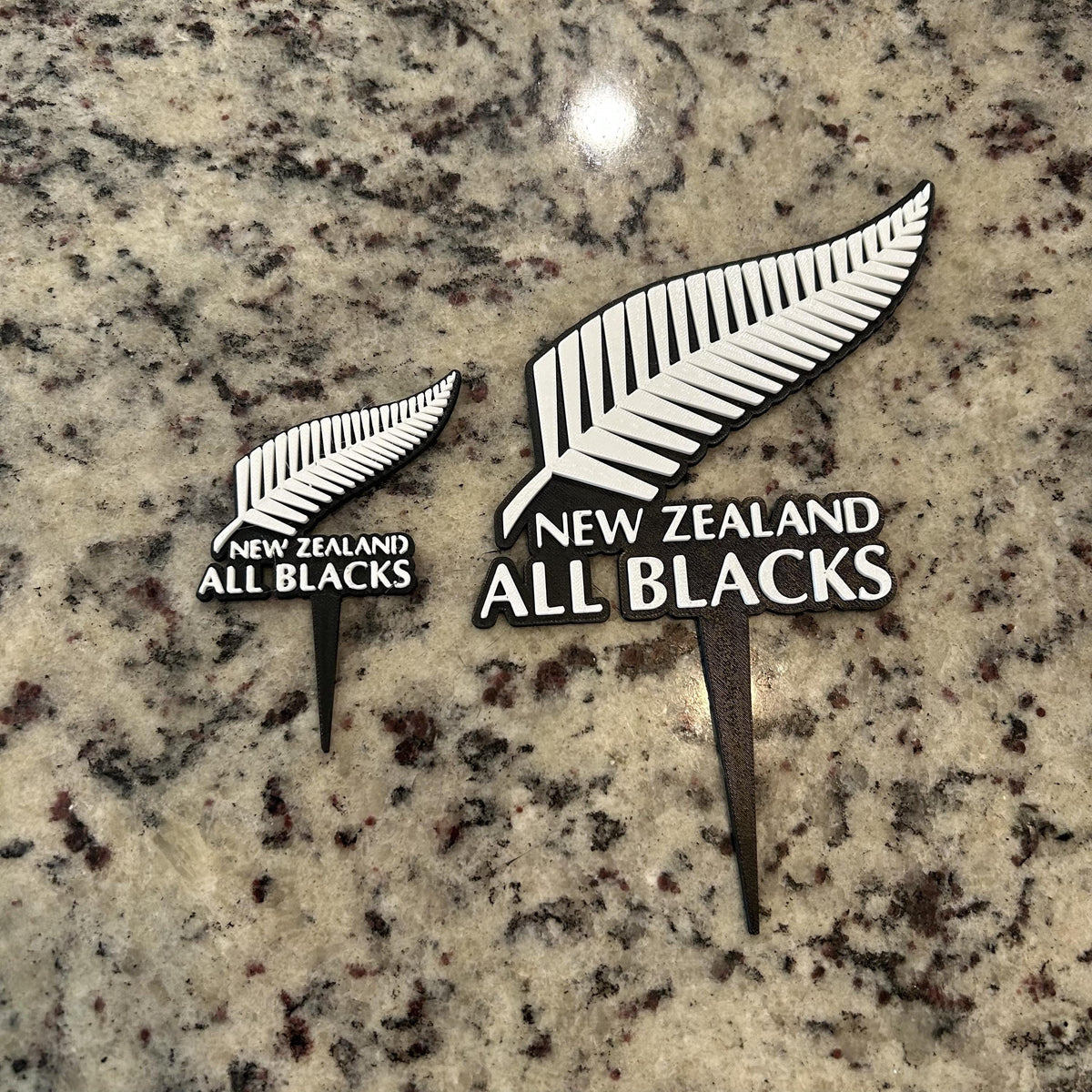 New Zealand All Blacks 3D printed cake topper and cupcake toppers, food-grade PETG silver fern emblem, rugby birthday party decoration, made in USA