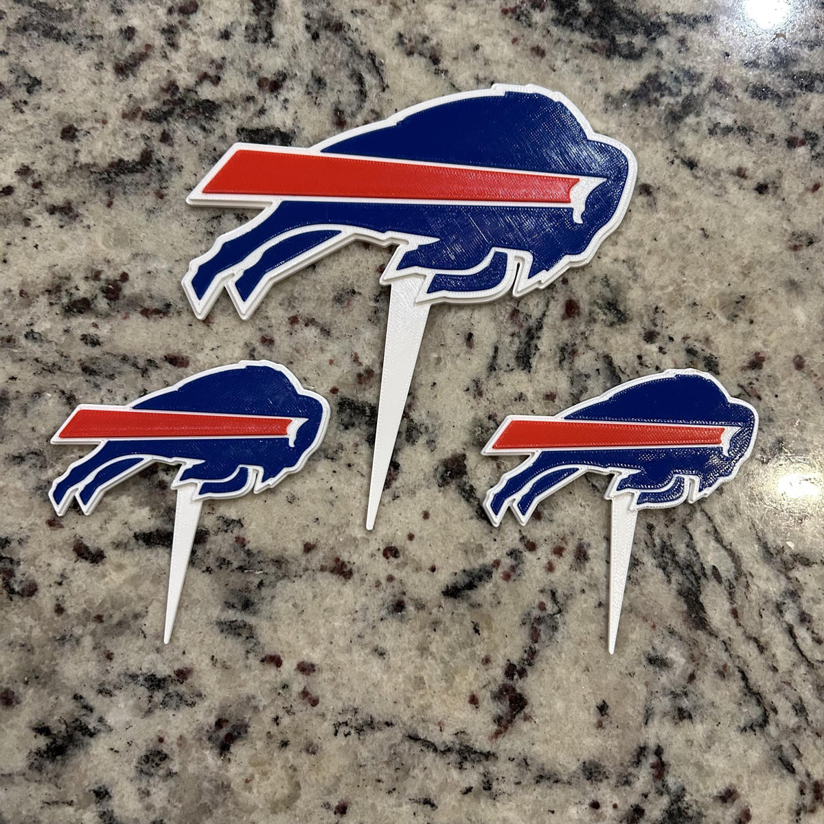 Buffalo Bills 3D printed cake topper and cupcake toppers, food-grade PETG charging buffalo logo, NFL football birthday party decoration, made in USA