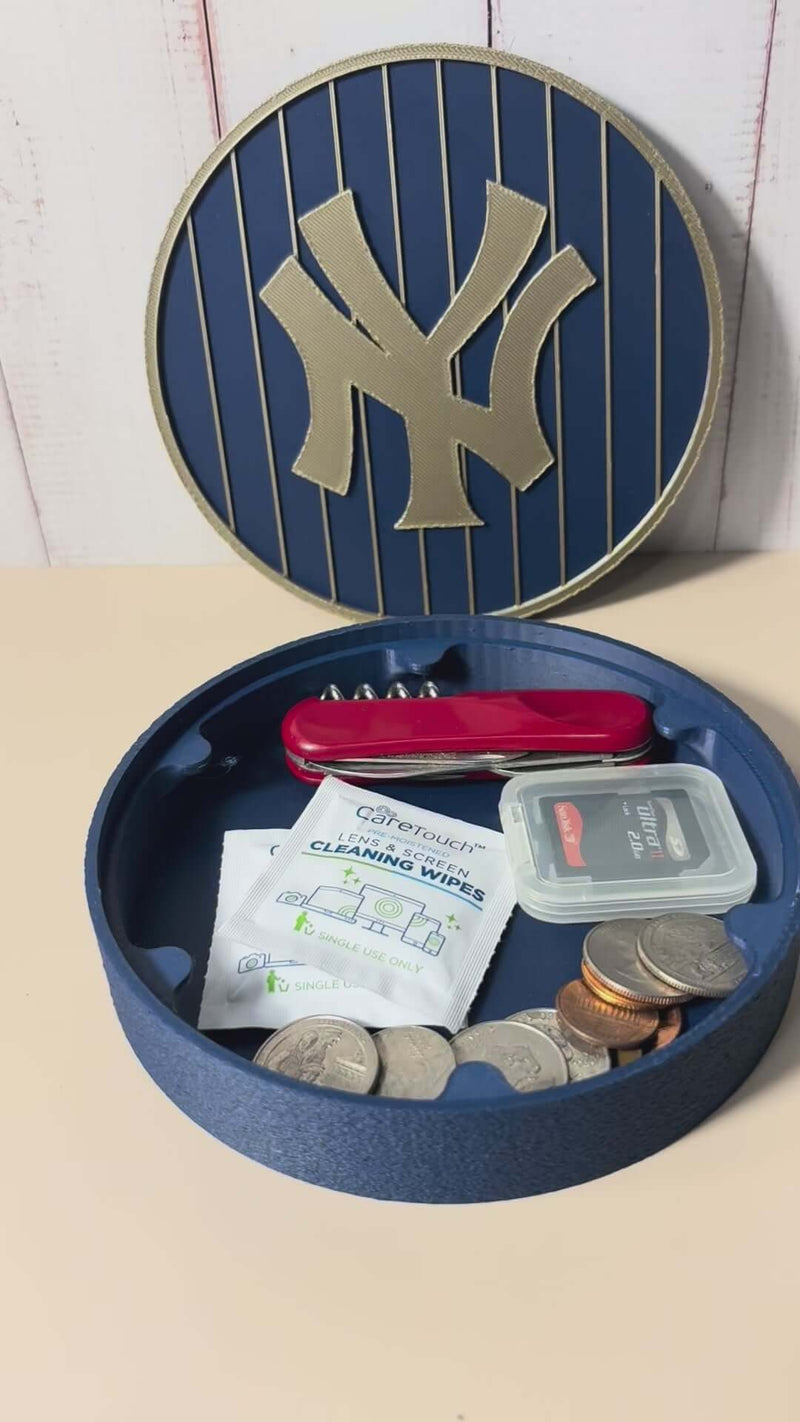 NY Yankees 3D Logo Stash Box in blue with gold detail, holding coins and accessories, made from high-quality materials.