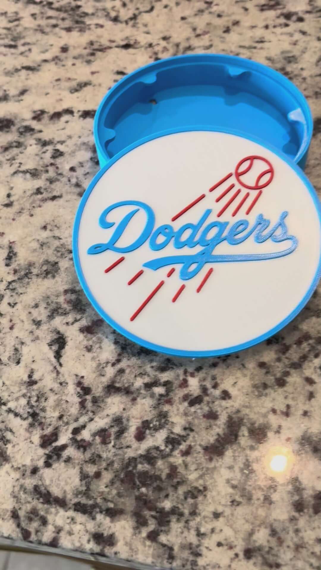 Load video: 3D printed Los Angeles Dodgers logo on a blue container, perfect for baseball fans and sports decor.