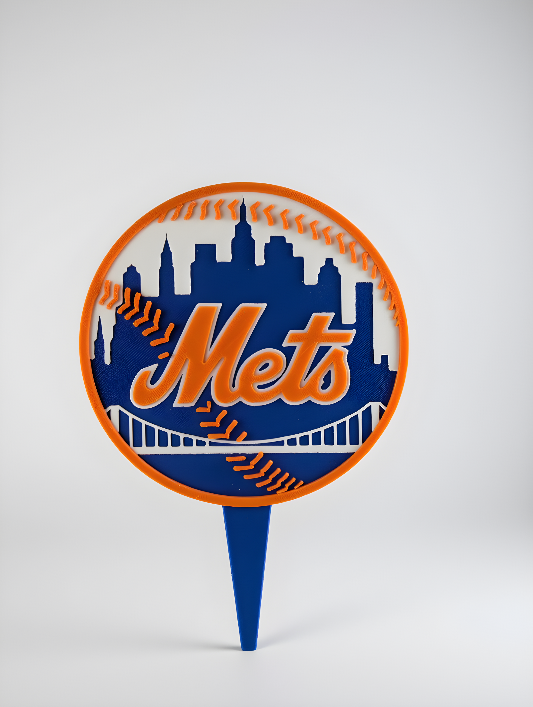 Mets cake topper front view — layered orange stitching, navy skyline, Mets wordmark